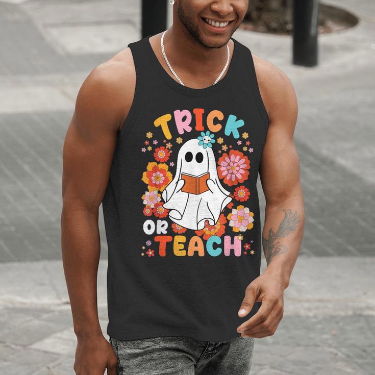 Groovy Halloween Trick Or Teach Retro Floral Ghost Teacher For Men Women Kids Men Tank Top, Groovy Teacher Tank Tops, funny gift Groovy Halloween Trick Or Teach Retro Floral Ghost Teacher For Men Women Kids Men Tank Top, Groovy Teacher Tank Tops, funny gift