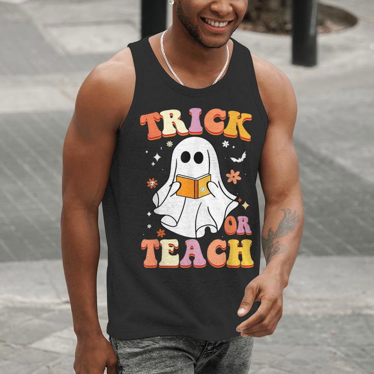 Retro Vintage Groovy Trick Or Teach Teacher Halloween For Men Women Kids Men Tank Top, Groovy Teacher Tank Tops, funny gift Retro Vintage Groovy Trick Or Teach Teacher Halloween For Men Women Kids Men Tank Top, Groovy Teacher Tank Tops, funny gift