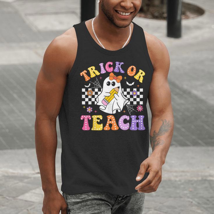 Trick Or Teach Groovy Halloween Teachers Men Tank Top, funny gift Trick Or Teach Groovy Halloween Teachers Men Tank Top, funny gift