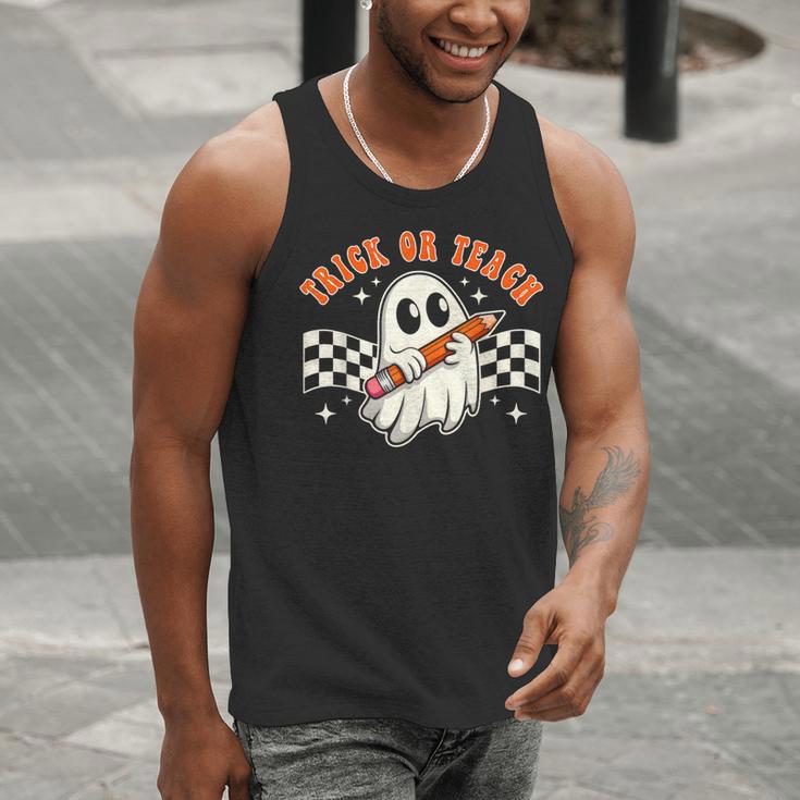 Trick Or Teach Groovy Retro Ghost Halloween Teacher Kids Men Tank Top, Groovy Teacher Tank Tops, funny gift