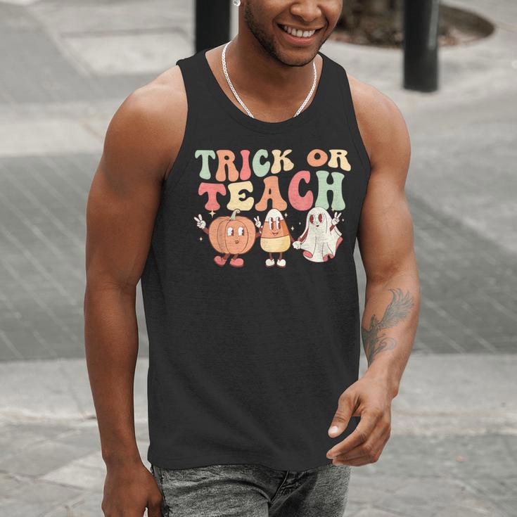 Trick Or Teach Pumpkin Candy Corn Ghost Halloween Teacher Men Tank Top, funny gift Trick Or Teach Pumpkin Candy Corn Ghost Halloween Teacher Men Tank Top, funny gift