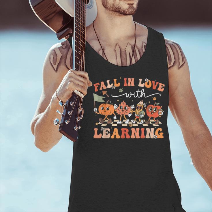 Fall In Love With Learning Autumn Teacher Thanksgiving Men Tank Top, gift for family, gift for coworker