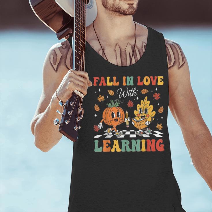 Groovy Fall In Love With Learning Autumn Pumpkin Teacher Men Tank Top, Groovy Teacher Tank Tops, gift for family, gift for coworker Groovy Fall In Love With Learning Autumn Pumpkin Teacher Men Tank Top, Groovy Teacher Tank Tops, gift for family, gift for coworker