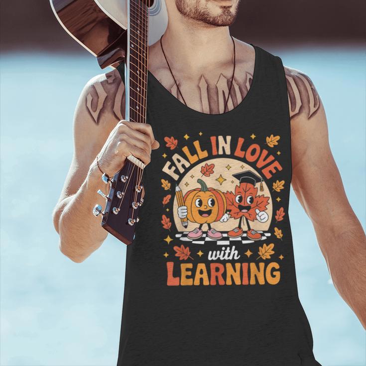 Retro Fall In Love With Learning Pumpkin Leaf Teacher Autumn Men Tank Top, gift for family, gift for coworker Retro Fall In Love With Learning Pumpkin Leaf Teacher Autumn Men Tank Top, gift for family, gift for coworker