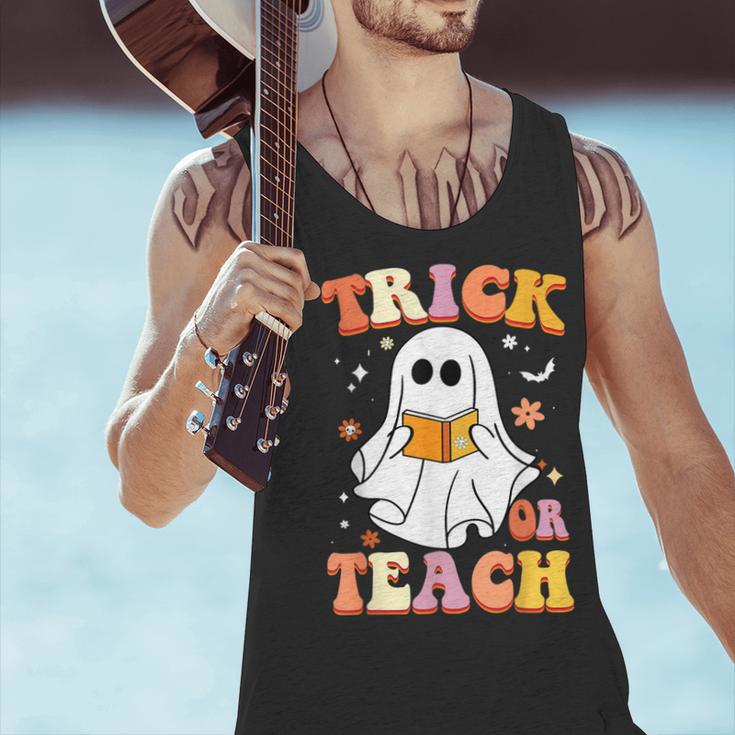 Retro Vintage Groovy Trick Or Teach Teacher Halloween For Men Women Kids Men Tank Top, Groovy Teacher Tank Tops, gift for family, gift for coworker Retro Vintage Groovy Trick Or Teach Teacher Halloween For Men Women Kids Men Tank Top, Groovy Teacher Tank Tops, gift for family, gift for coworker