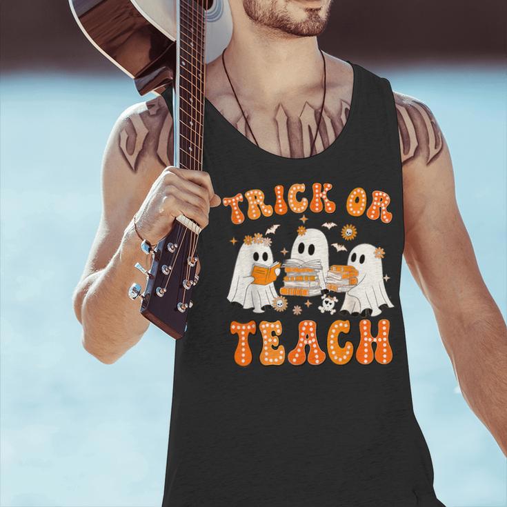 Teacher Halloween Trick Or Teach Retro Groovy Floral Ghost Men Tank Top, Groovy Teacher Tank Tops, gift for family, gift for coworker Teacher Halloween Trick Or Teach Retro Groovy Floral Ghost Men Tank Top, Groovy Teacher Tank Tops, gift for family, gift for coworker