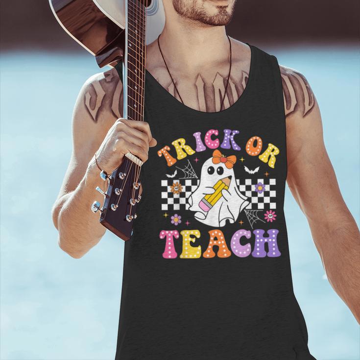 Trick Or Teach Groovy Halloween Teachers Men Tank Top, gift for family, gift for coworker Trick Or Teach Groovy Halloween Teachers Men Tank Top, gift for family, gift for coworker