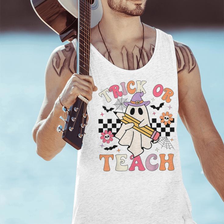 Trick Or Teach Groovy Teacher Halloween Retro Floral Ghost Men Tank Top, Groovy Teacher Tank Tops, gift for family, gift for coworker Trick Or Teach Groovy Teacher Halloween Retro Floral Ghost Men Tank Top, Groovy Teacher Tank Tops, gift for family, gift for coworker