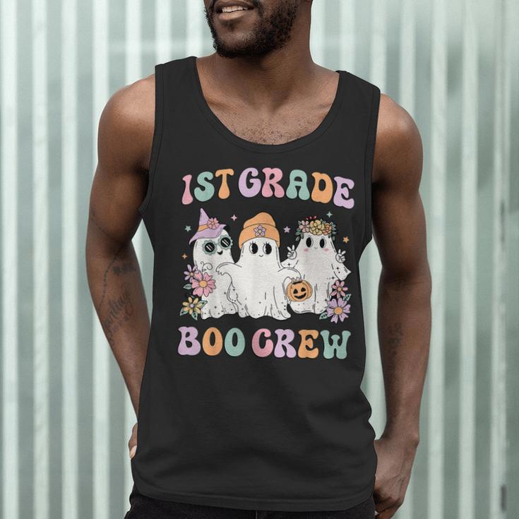 1st Grade Boo Crew Groovy Halloween Floral Ghost Kid Teacher Men Tank Top, novelty gifts, funny gifts