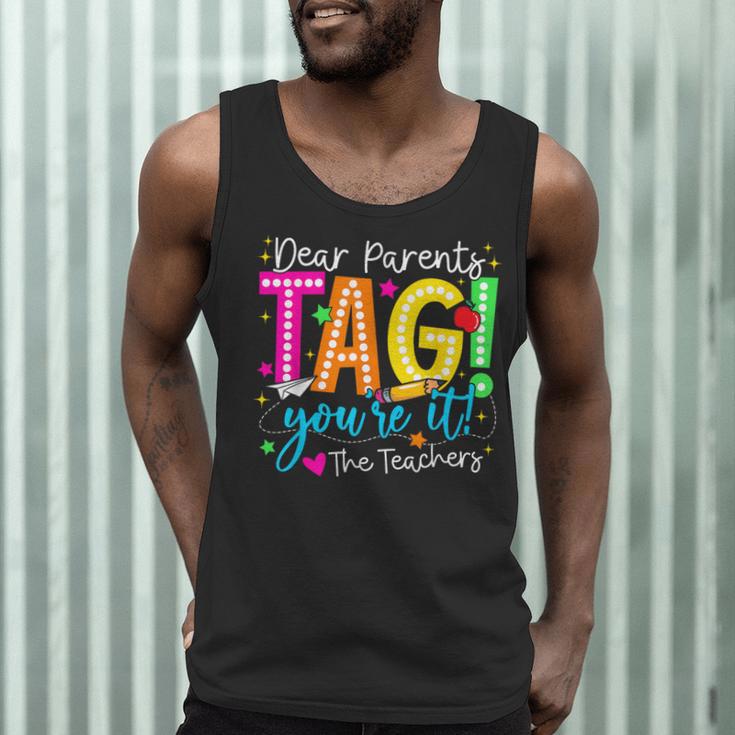 Dear Parents Tag You'Re It Love Teachers Last Day Of School Men Tank Top, novelty gifts, funny gifts Dear Parents Tag You'Re It Love Teachers Last Day Of School Men Tank Top, novelty gifts, funny gifts