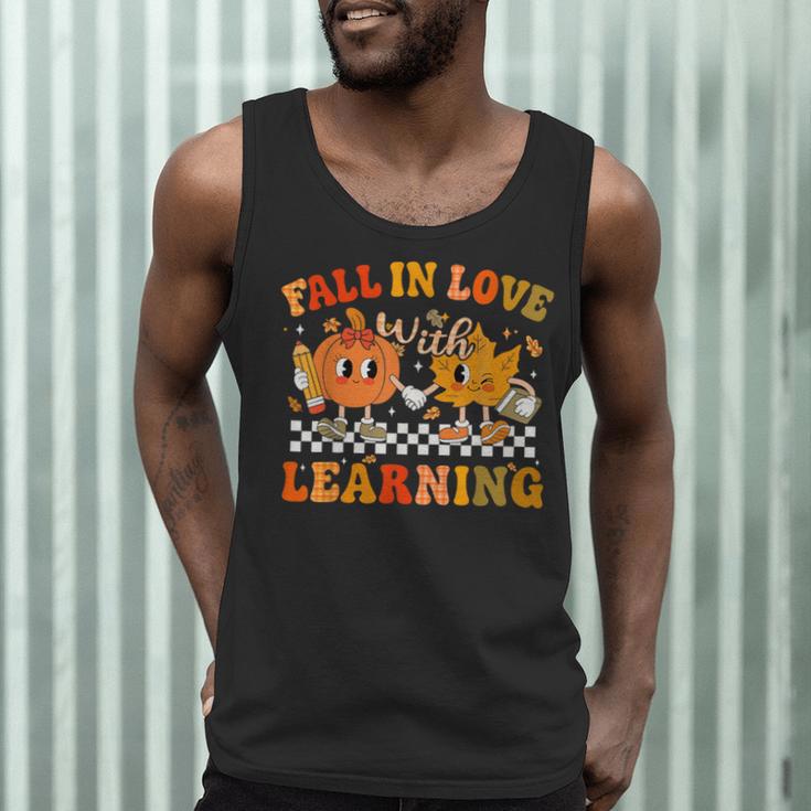 Fall In Love With Learning Autumn Pumpkin Fall Teacher Kids Men Tank Top, novelty gifts, funny gifts