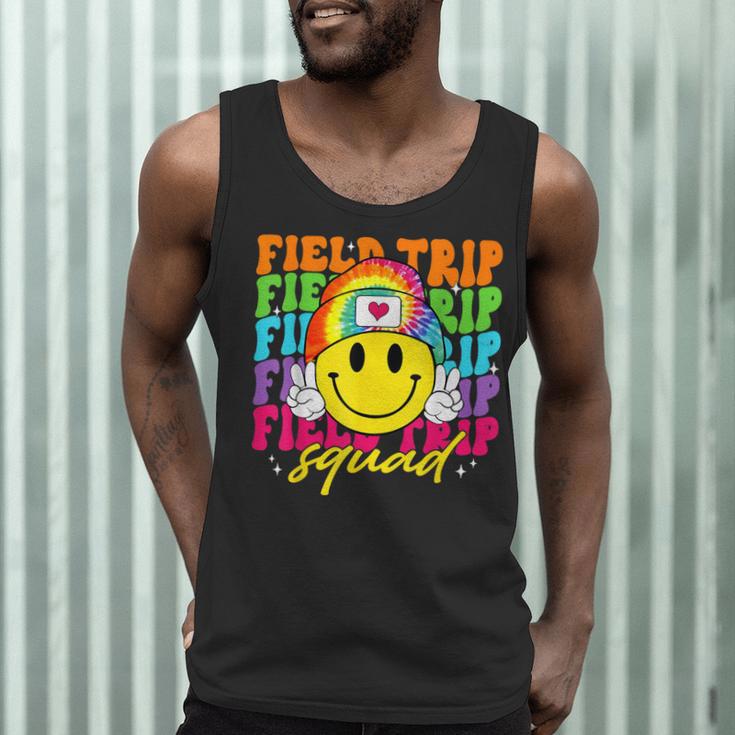 Field Trip Squad Groovy Field Day Smile Face Teacher Tie Dye Men Tank Top, novelty gifts, funny gifts