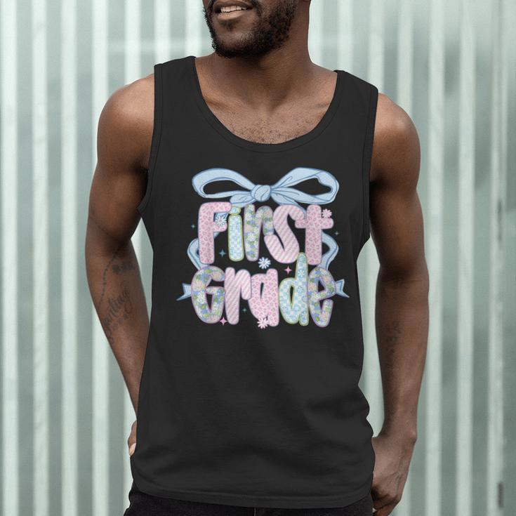 First Grade Coquette Bow Girls Teacher Team 1st Grade Squad Men Tank Top, novelty gifts, funny gifts