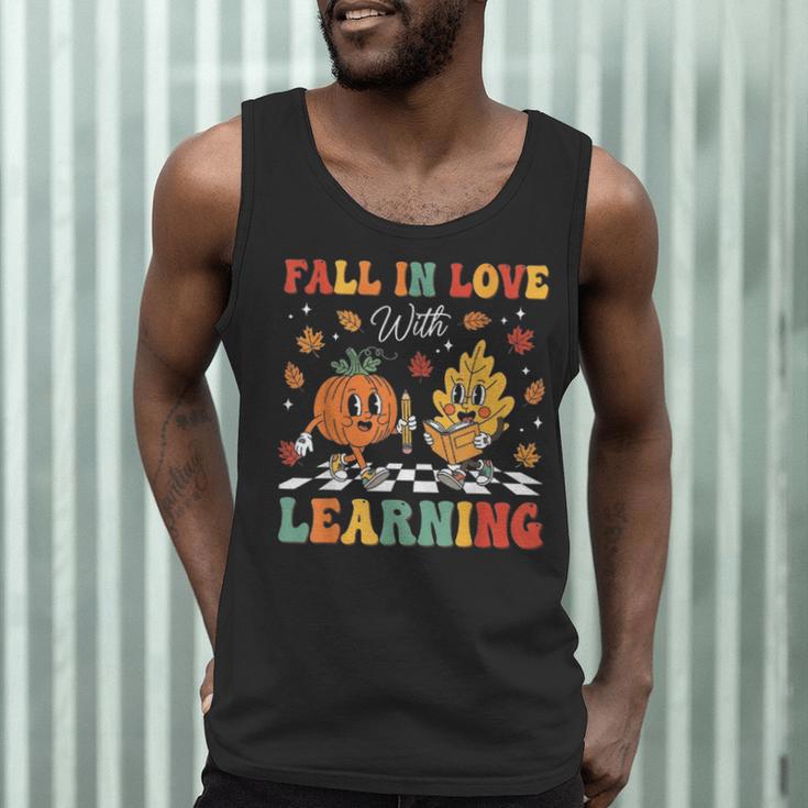 Groovy Fall In Love With Learning Autumn Pumpkin Teacher Men Tank Top, novelty gifts, funny gifts Groovy Fall In Love With Learning Autumn Pumpkin Teacher Men Tank Top, novelty gifts, funny gifts