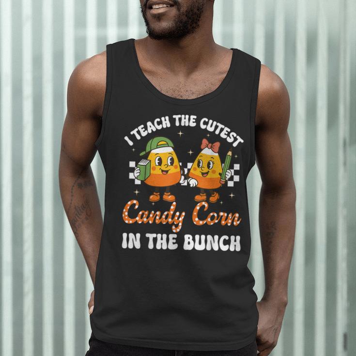 Halloween Teacher Cutest Candy Corn Groovy Spooky Teachers Men Tank Top, novelty gifts, funny gifts