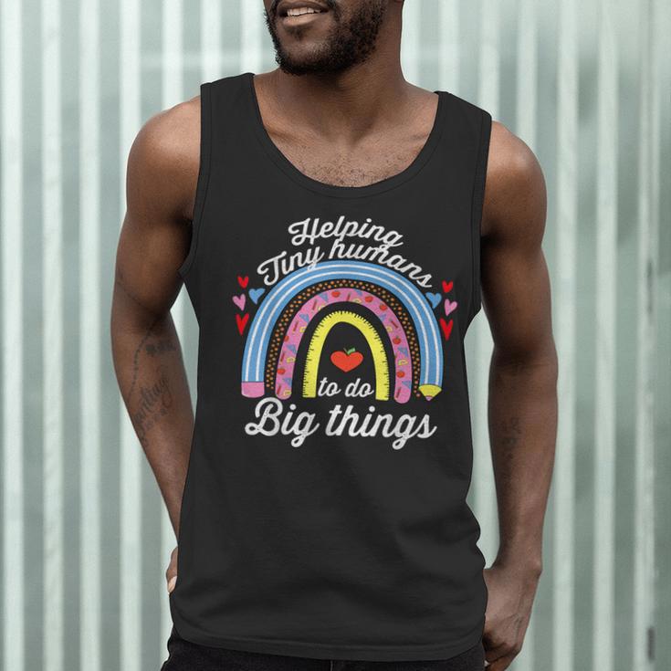 Helping Tiny Humans To Do Big Things Teacher Women Men Tank Top, novelty gifts, funny gifts Helping Tiny Humans To Do Big Things Teacher Women Men Tank Top, novelty gifts, funny gifts