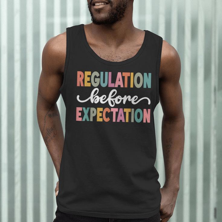 Regulation Before Expectation Cute ABA SPED Teacher Therapy Men Tank Top, novelty gifts, funny gifts Regulation Before Expectation Cute ABA SPED Teacher Therapy Men Tank Top, novelty gifts, funny gifts