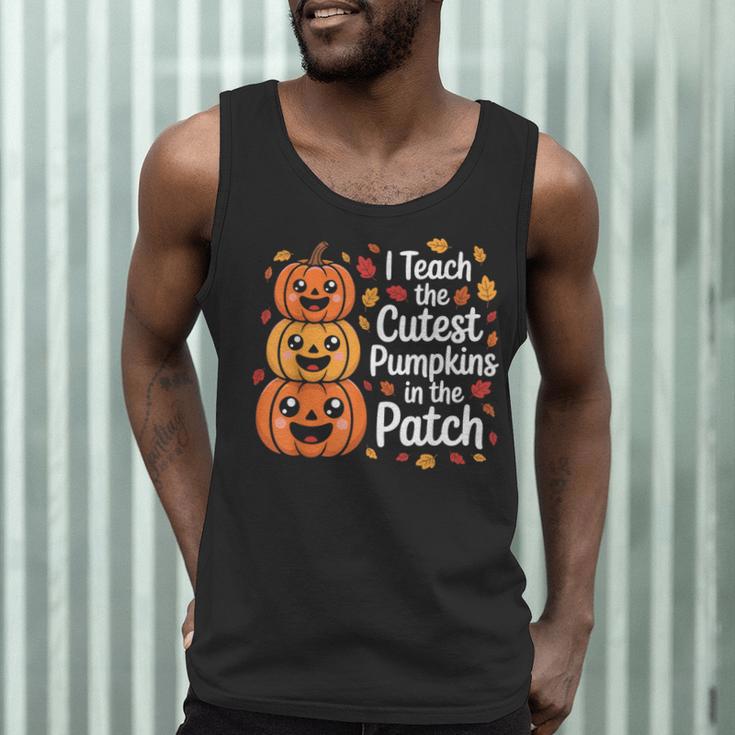 i Teach The Cutest Pumpkins In The Patch Teacher Halloween Men Tank Top, novelty gifts, funny gifts