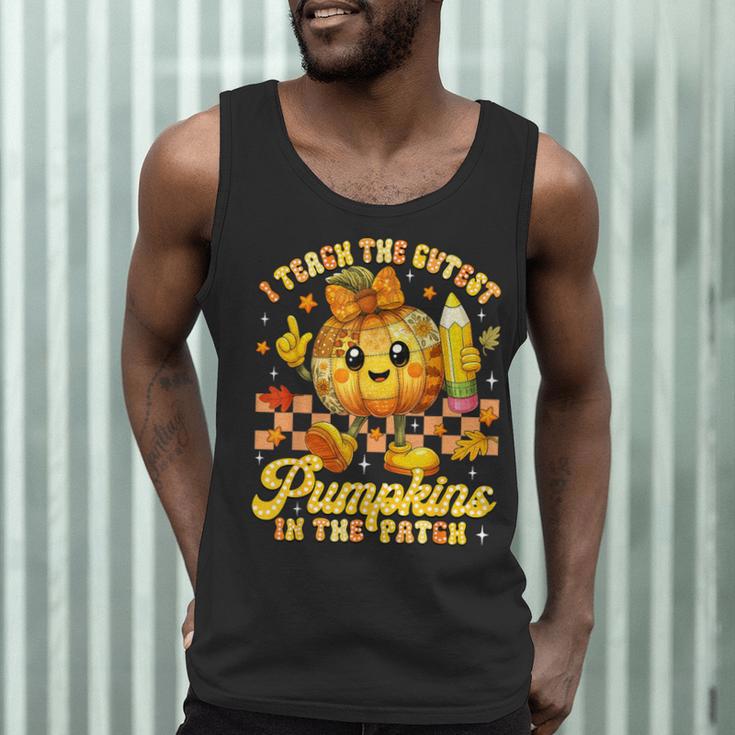 I Teach The Cutest Pumpkins In The Patch Teacher Halloween Men Tank Top, novelty gifts, funny gifts