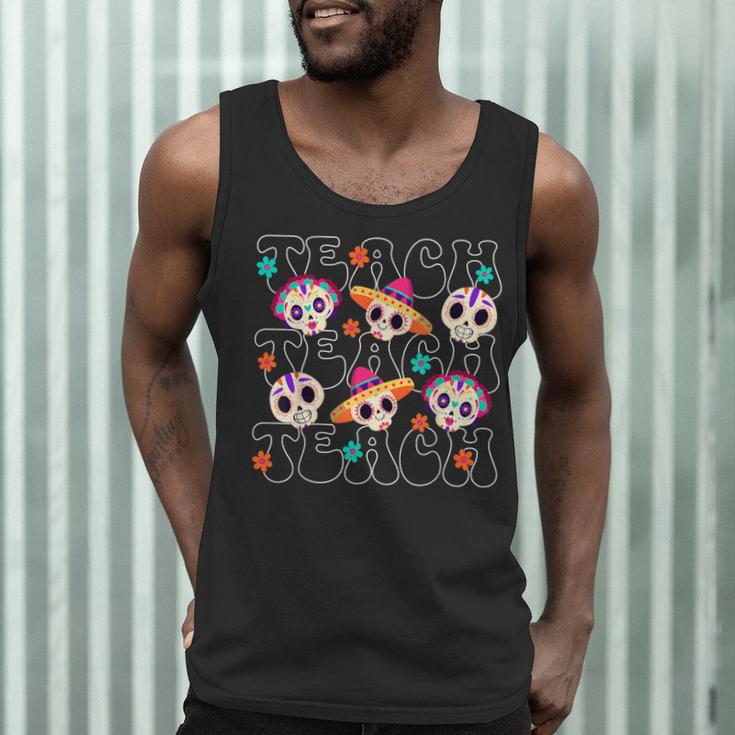 Teach Teacher Dia De Los Muertos Day Of The Dead Sugar Skull Men Tank Top, novelty gifts, funny gifts Teach Teacher Dia De Los Muertos Day Of The Dead Sugar Skull Men Tank Top, novelty gifts, funny gifts