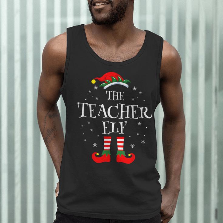 The Teacher Elf Christmas Family Matching Group Xmas Men Tank Top, novelty gifts, funny gifts The Teacher Elf Christmas Family Matching Group Xmas Men Tank Top, novelty gifts, funny gifts