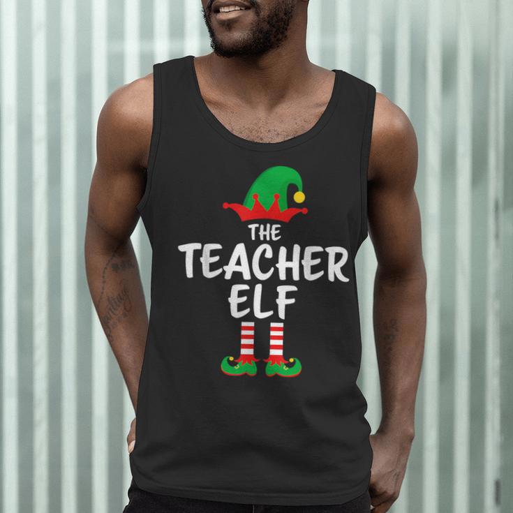 The Teacher Elf Matching Family Christmas Men Tank Top, novelty gifts, funny gifts The Teacher Elf Matching Family Christmas Men Tank Top, novelty gifts, funny gifts