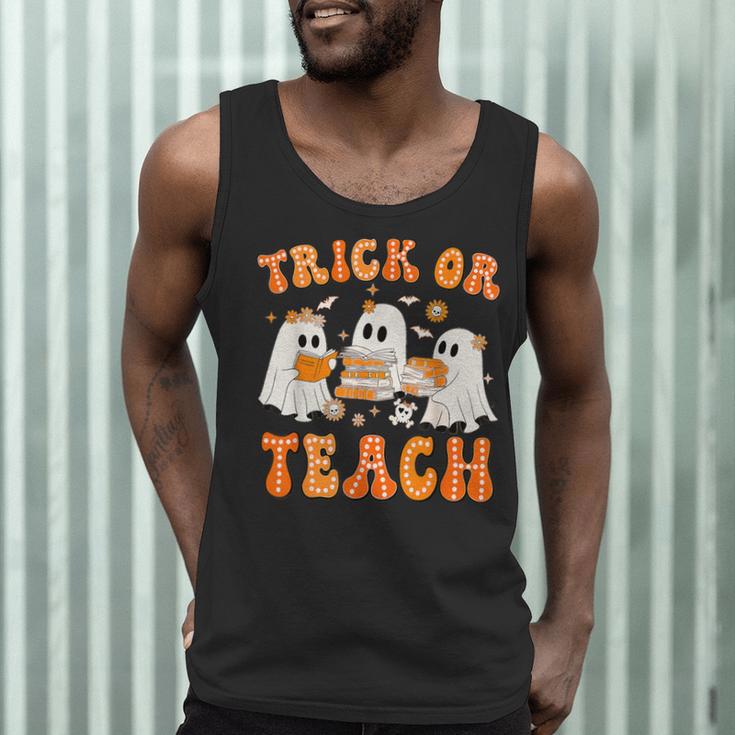 Teacher Halloween Trick Or Teach Retro Groovy Floral Ghost Men Tank Top, novelty gifts, funny gifts Teacher Halloween Trick Or Teach Retro Groovy Floral Ghost Men Tank Top, novelty gifts, funny gifts