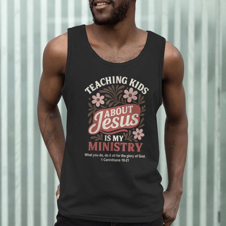 Teaching Kids About Jesus Is My Ministry Christian Teacher Men Tank Top, novelty gifts, funny gifts Teaching Kids About Jesus Is My Ministry Christian Teacher Men Tank Top, novelty gifts, funny gifts