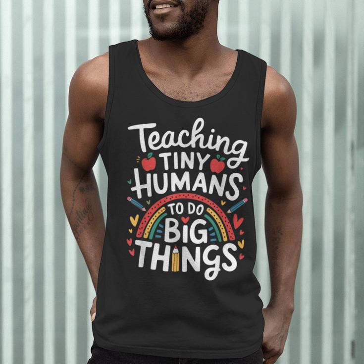 Teaching Tiny Humans Big Things I Teacher Men Tank Top, novelty gifts, funny gifts Teaching Tiny Humans Big Things I Teacher Men Tank Top, novelty gifts, funny gifts