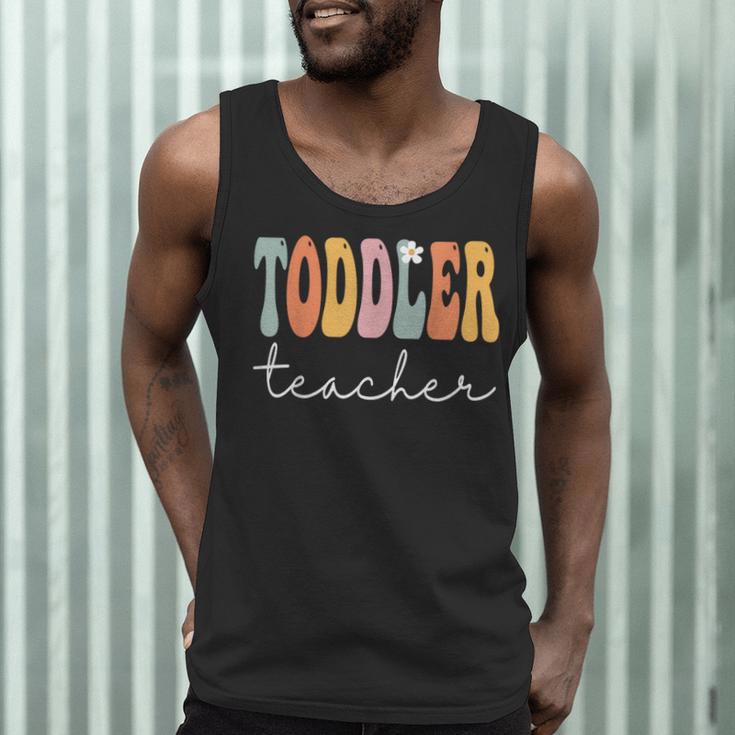Toddler Teacher Retro Groovy Women Happy First Day Of School Men Tank Top, novelty gifts, funny gifts