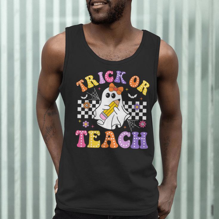 Trick Or Teach Groovy Halloween Teachers Men Tank Top, novelty gifts, funny gifts Trick Or Teach Groovy Halloween Teachers Men Tank Top, novelty gifts, funny gifts