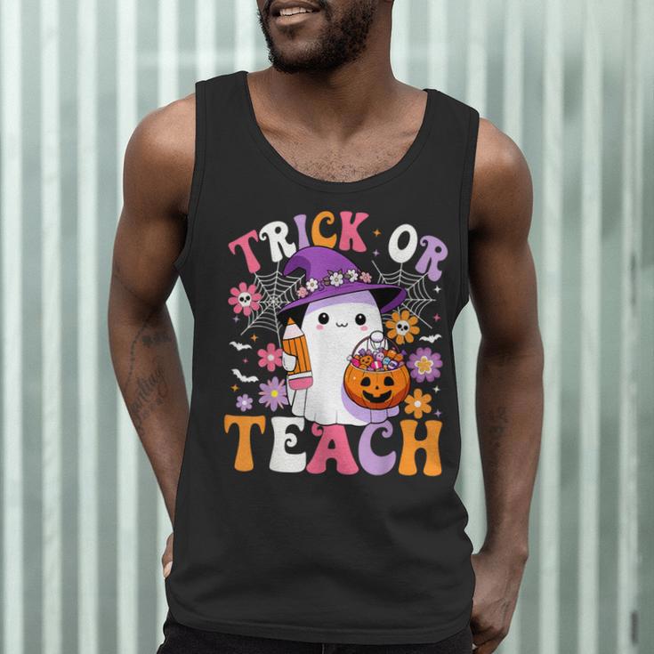 Trick Or Teach Groovy Teacher Ghost Halloween Teacher Men Tank Top, novelty gifts, funny gifts Trick Or Teach Groovy Teacher Ghost Halloween Teacher Men Tank Top, novelty gifts, funny gifts