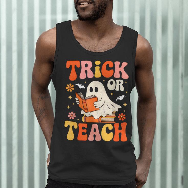 Trick Or Teach Halloween Shirt For Teacher Kids Floral Ghost Men Tank Top, novelty gifts, funny gifts Trick Or Teach Halloween Shirt For Teacher Kids Floral Ghost Men Tank Top, novelty gifts, funny gifts