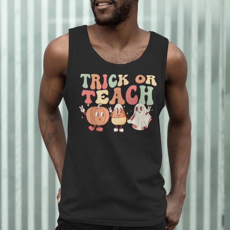 Trick Or Teach Pumpkin Candy Corn Ghost Halloween Teacher Men Tank Top, novelty gifts, funny gifts Trick Or Teach Pumpkin Candy Corn Ghost Halloween Teacher Men Tank Top, novelty gifts, funny gifts