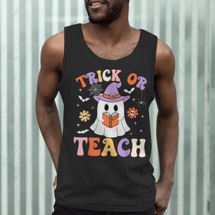 Trick Or Teach Teacher Groovy Ghost Halloween Teacher Men Tank Top, novelty gifts, funny gifts Trick Or Teach Teacher Groovy Ghost Halloween Teacher Men Tank Top, novelty gifts, funny gifts