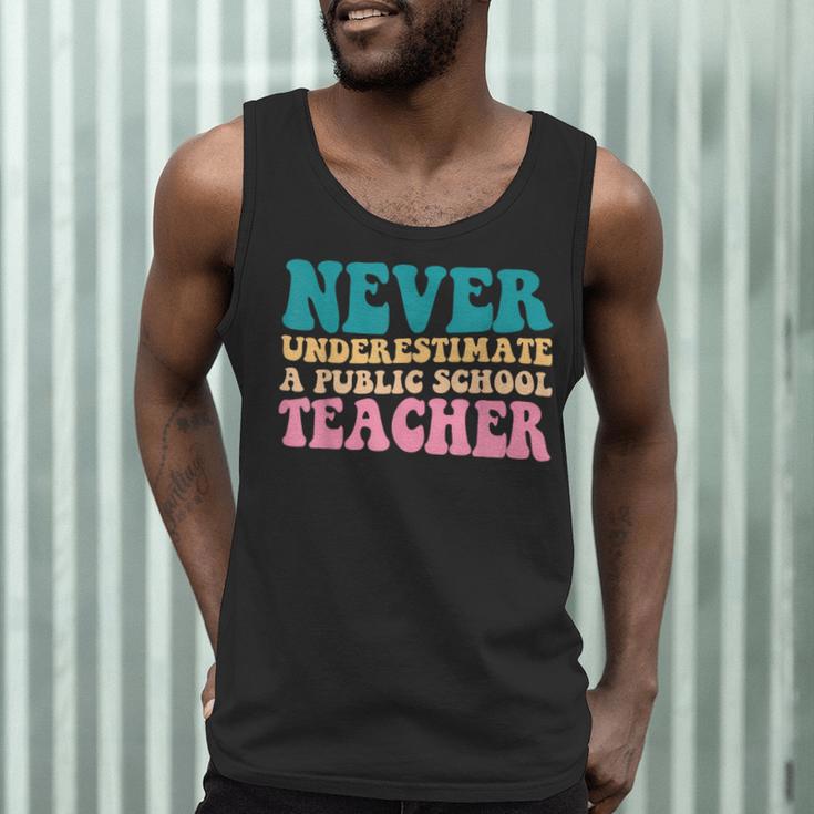 Never Underestimate A Public School Teacher Groovy Women Men Tank Top, novelty gifts, funny gifts Never Underestimate A Public School Teacher Groovy Women Men Tank Top, novelty gifts, funny gifts