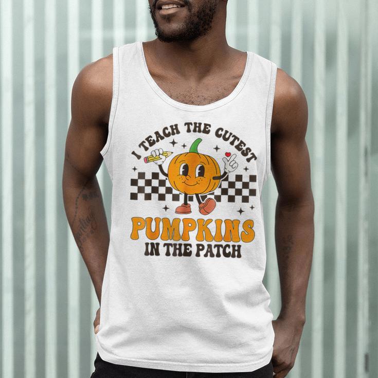 I Teach The Cutest Pumpkins In The Patch Groovy Teacher Fall Men Tank Top, novelty gifts, funny gifts
