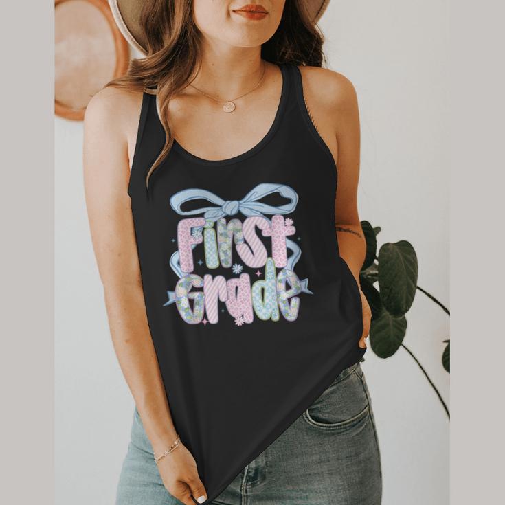 First Grade Coquette Bow Girls Teacher Team 1st Grade Squad Flowy Tank, funny design