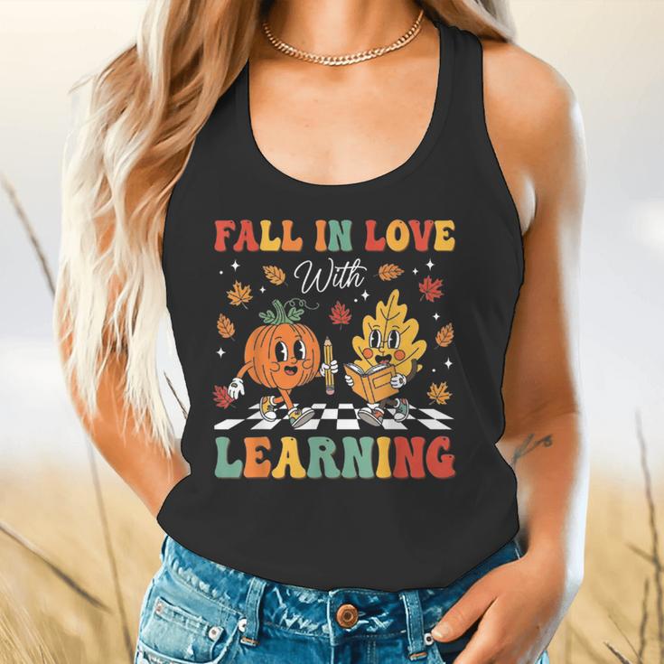 Groovy Fall In Love With Learning Autumn Pumpkin Teacher Flowy Tank, gift for family, gift for coworker Groovy Fall In Love With Learning Autumn Pumpkin Teacher Flowy Tank, gift for family, gift for coworker
