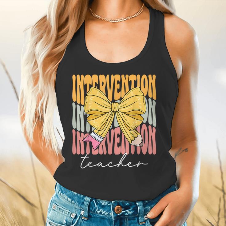 Interventionist Teacher Groovy Coquette Bow Back To School Flowy Tank, gift for family, gift for coworker Interventionist Teacher Groovy Coquette Bow Back To School Flowy Tank, gift for family, gift for coworker