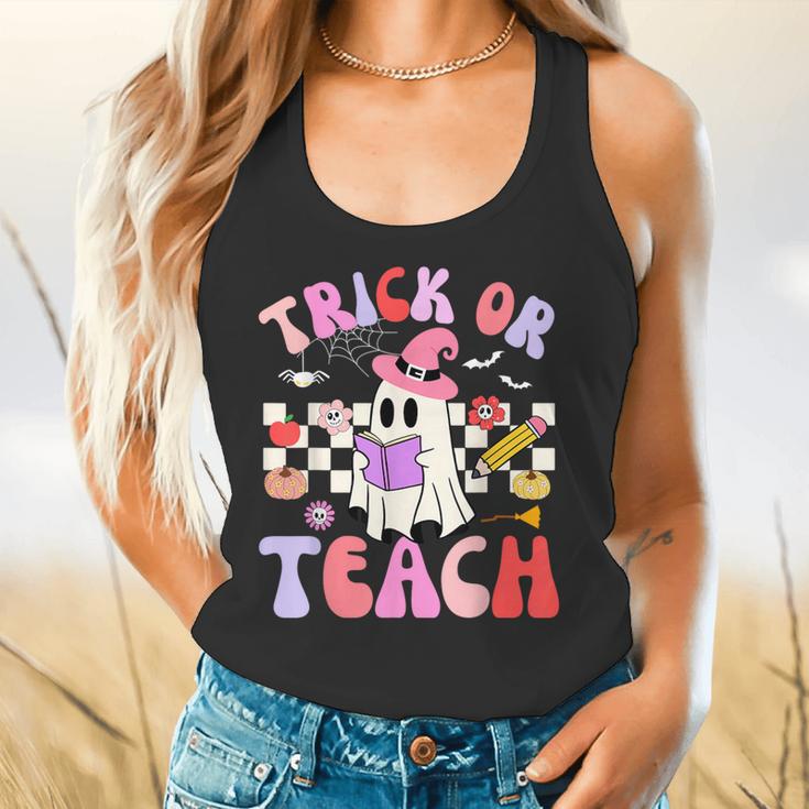 Trick Or Teach Halloween Teacher Floral Ghost Groovy Flowy Tank, gift for family, gift for coworker Trick Or Teach Halloween Teacher Floral Ghost Groovy Flowy Tank, gift for family, gift for coworker