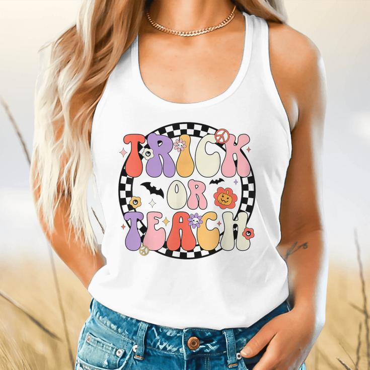 Trick Or Teach Retro Groovy Halloween Teacher Flowy Tank, gift for family, gift for coworker Trick Or Teach Retro Groovy Halloween Teacher Flowy Tank, gift for family, gift for coworker