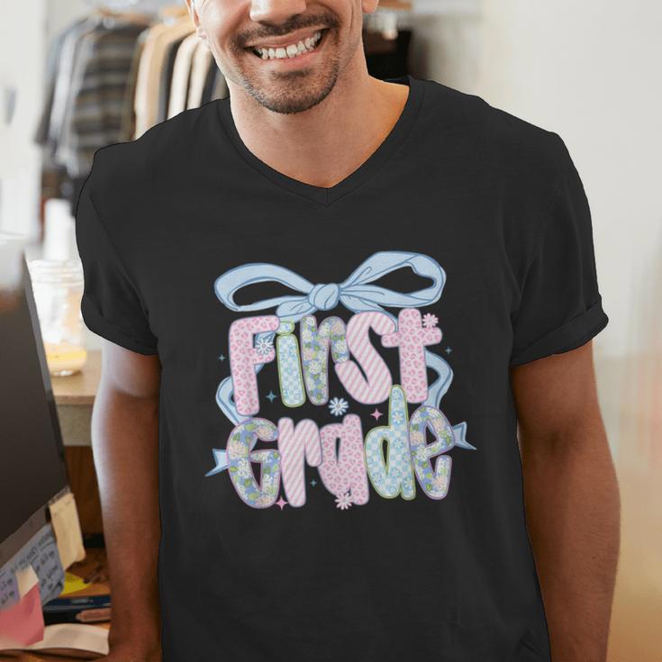 First Grade Coquette Bow Girls Teacher Team 1st Grade Squad Men's V-Neck T-Shirt, First Grade Teacher Shirts, funny gift First Grade Coquette Bow Girls Teacher Team 1st Grade Squad Men's V-Neck T-Shirt, First Grade Teacher Shirts, funny gift