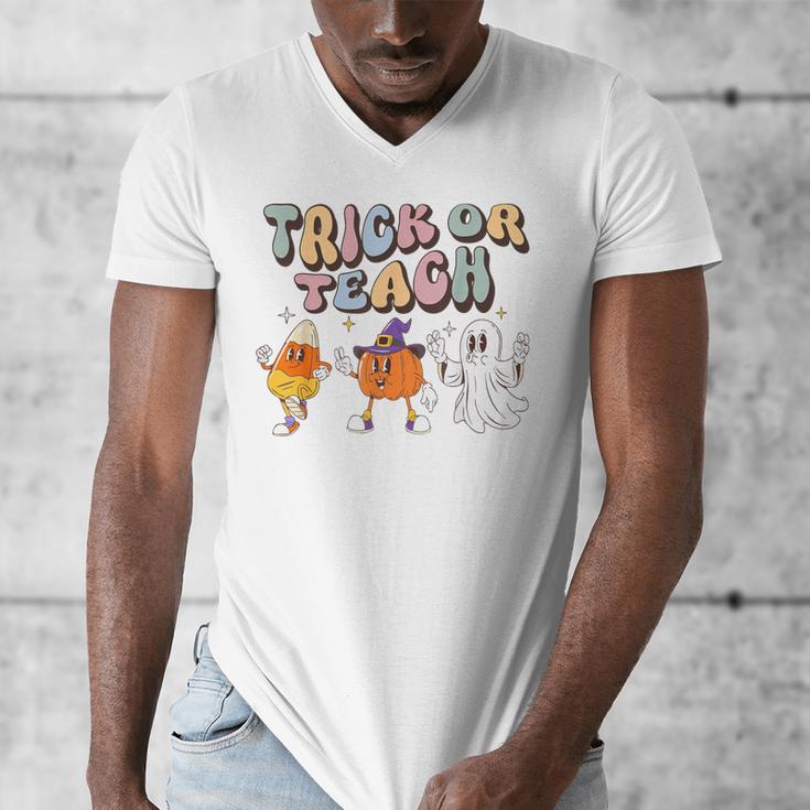 Trick Or Teach Candy Corn Pumpkin Ghost Teacher Men's V-Neck T-Shirt, funny design
