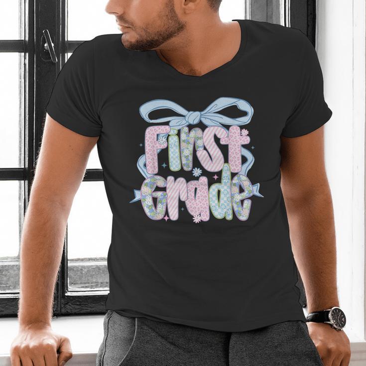 First Grade Coquette Bow Girls Teacher Team 1st Grade Squad Men's V-Neck T-Shirt, First Grade Teacher Shirts, gift for family, gift for coworker First Grade Coquette Bow Girls Teacher Team 1st Grade Squad Men's V-Neck T-Shirt, First Grade Teacher Shirts, gift for family, gift for coworker