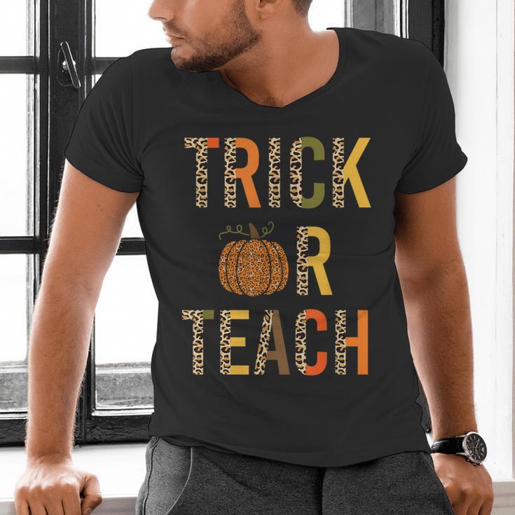 Leopard Trick Or Teach Halloween Teacher Costume Women Men's V-Neck T-Shirt, gift for family, gift for coworker Leopard Trick Or Teach Halloween Teacher Costume Women Men's V-Neck T-Shirt, gift for family, gift for coworker