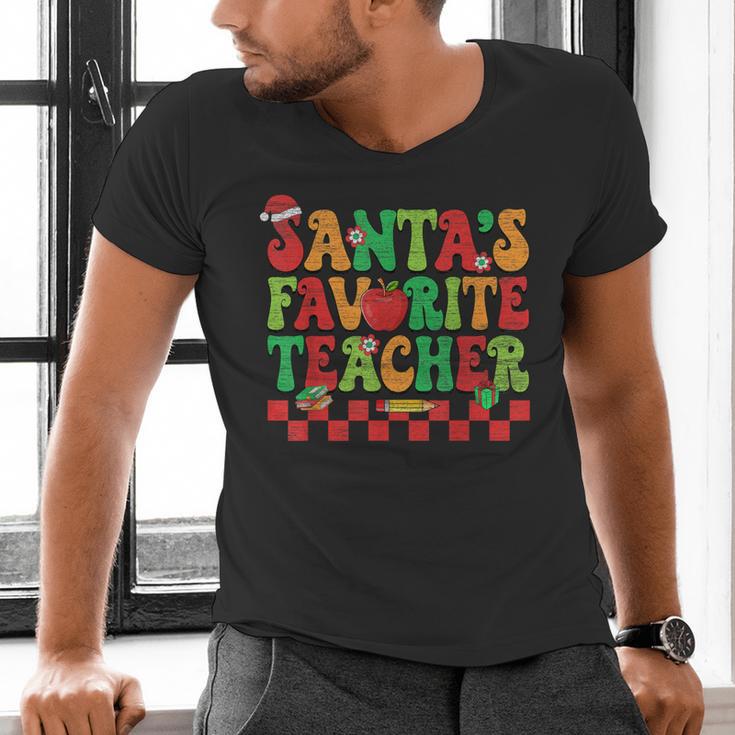 Santas Favorite Teacher Retro Groovy Christmas Xmas Women Men's V-Neck T-Shirt, Groovy Teacher Shirts, gift for family, gift for coworker Santas Favorite Teacher Retro Groovy Christmas Xmas Women Men's V-Neck T-Shirt, Groovy Teacher Shirts, gift for family, gift for coworker