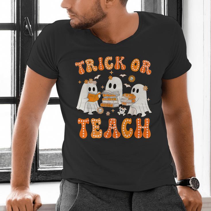 Teacher Halloween Trick Or Teach Retro Groovy Floral Ghost Men's V-Neck T-Shirt, Groovy Teacher Shirts, gift for family, gift for coworker