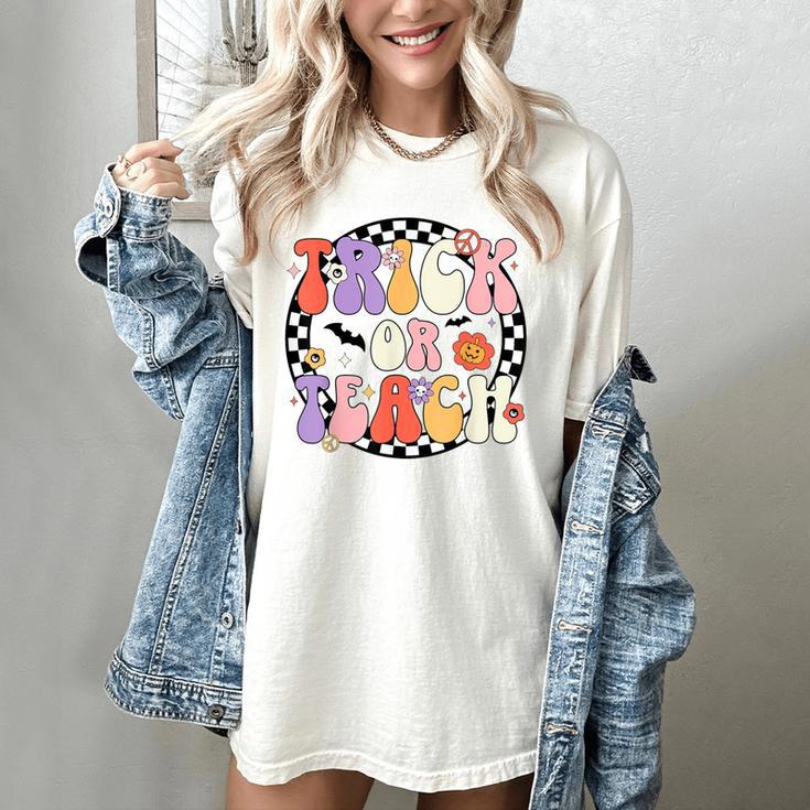 Trick Or Teach Retro Groovy Halloween Teacher Women's Comfort Colors T-Shirt Trick Or Teach Retro Groovy Halloween Teacher Women's Comfort Colors T-Shirt