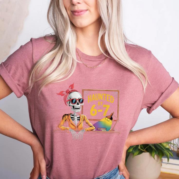 Haunted By 6-7 Teacher Halloween 67 Women's Heather T-Shirt